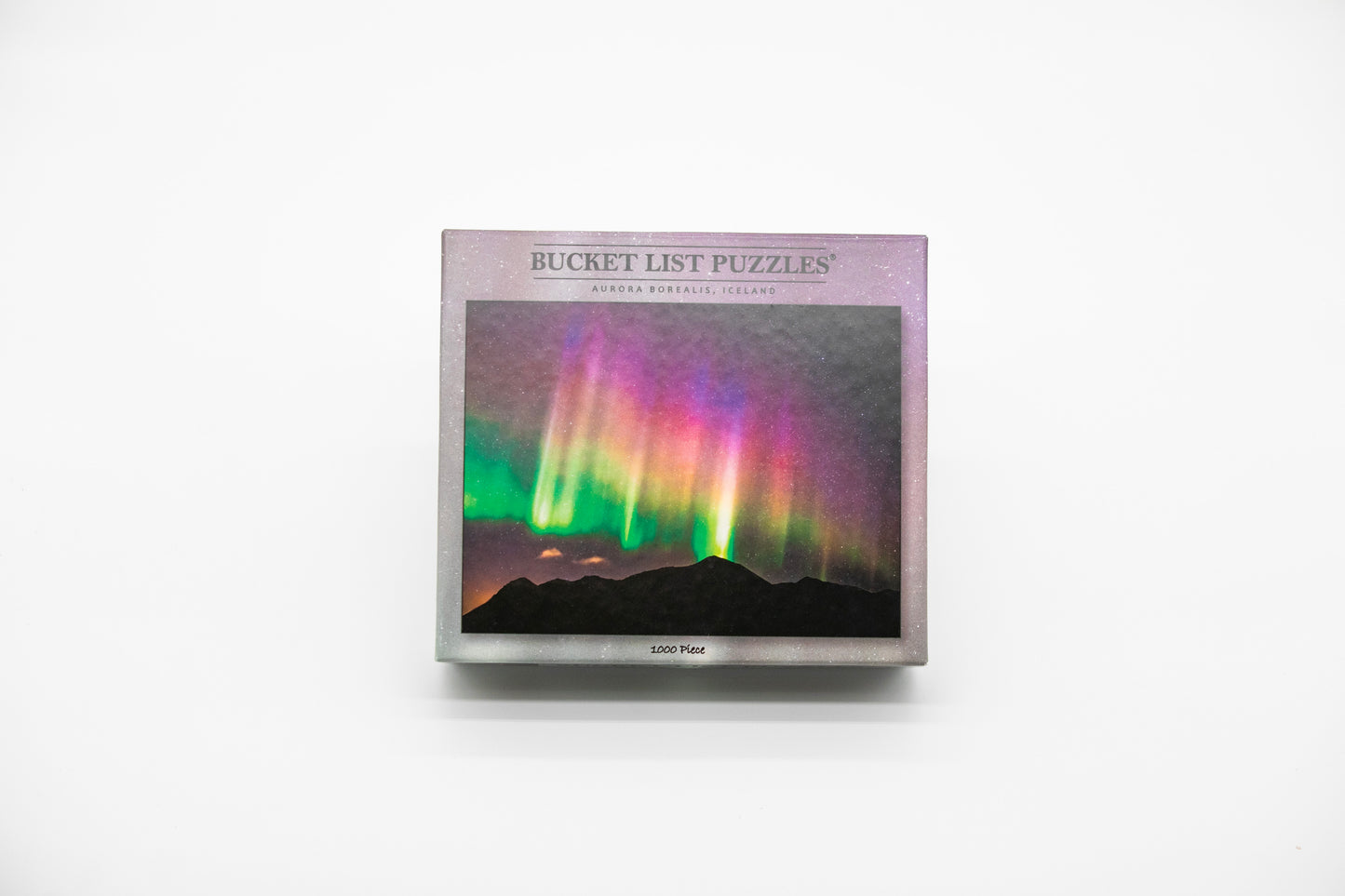 Bucket List Puzzles packaging with Northern Lights design on a white background