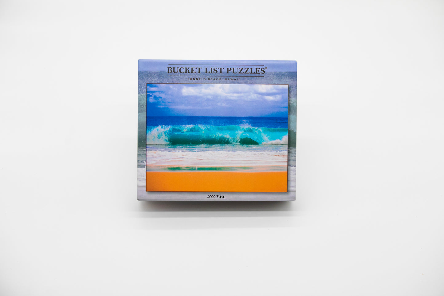 Bucket List Puzzles packaging with a beach scene on a white background