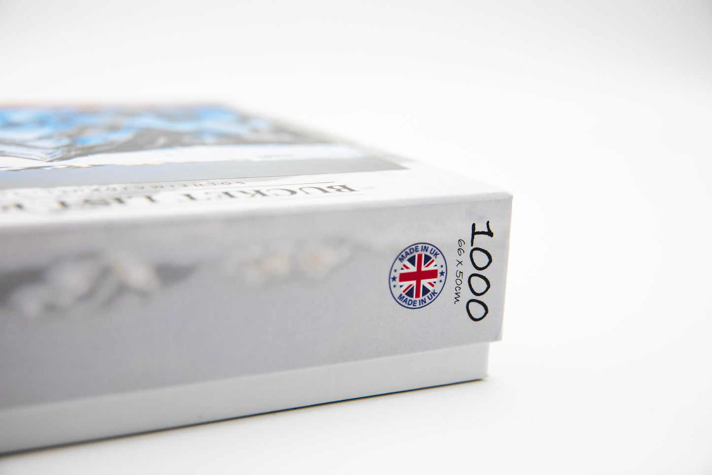 Jigsaw puzzle box with a Union Jack logo and '1000' pieces on a white background