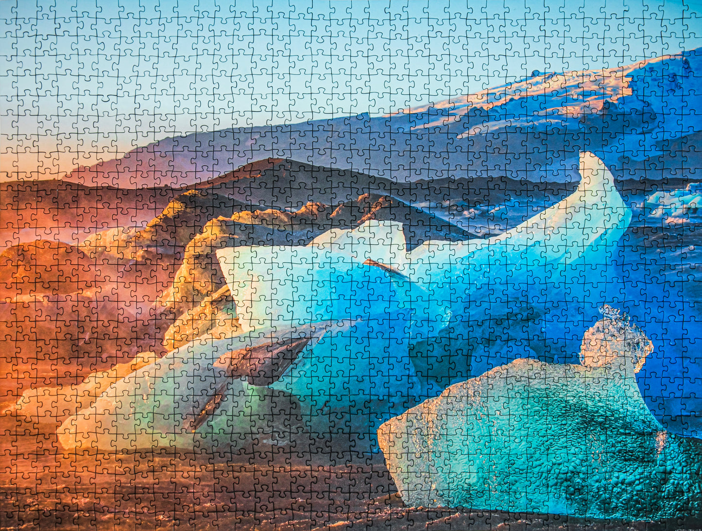Jigsaw puzzle with a scenic landscape featuring icebergs and mountains.
