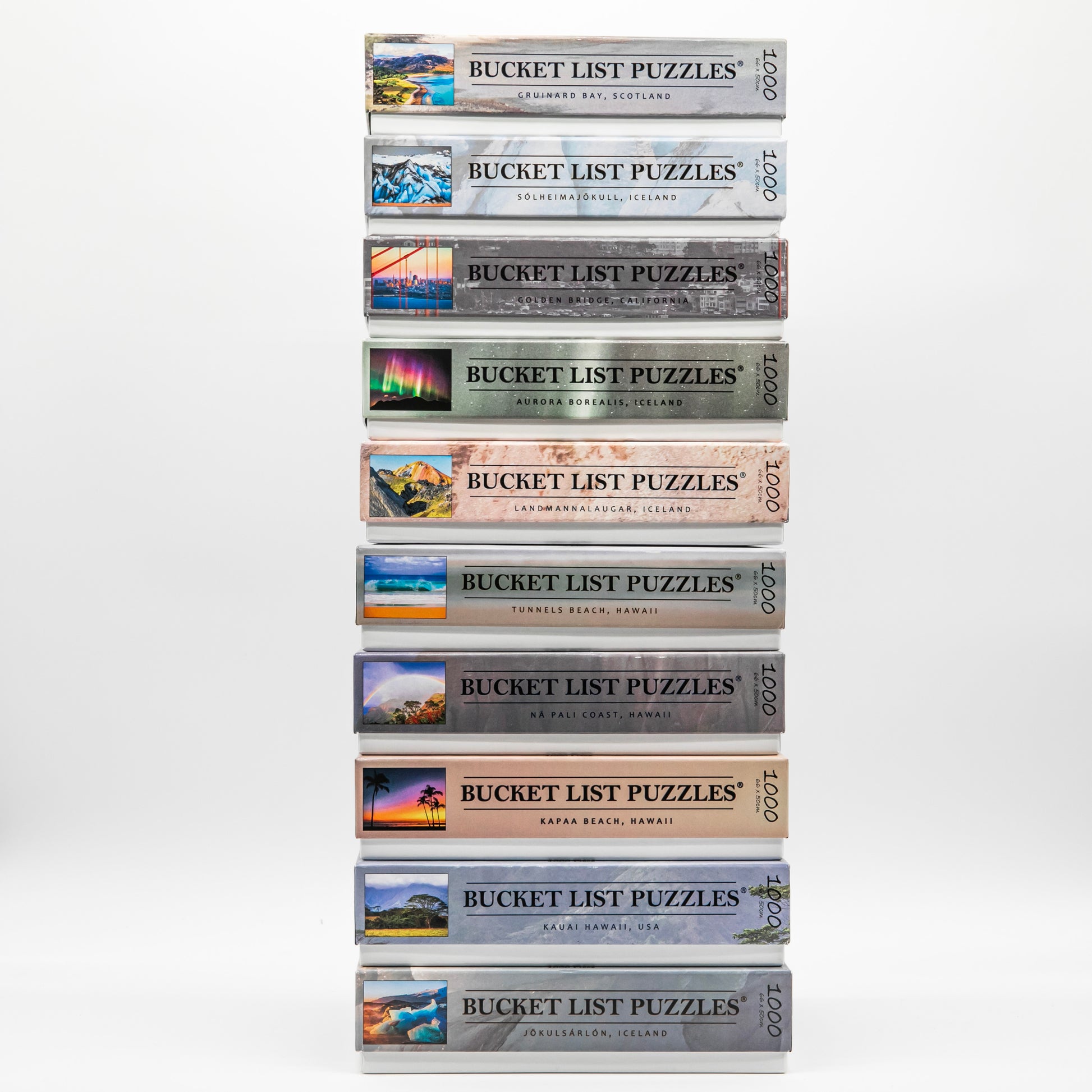 Stack of 'Bucket List Puzzles' boxes with various travel destinations on a white background