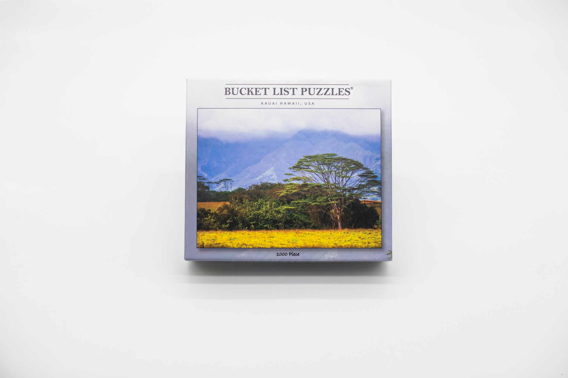 Bucket List Puzzles packaging with a scenic image on a white background