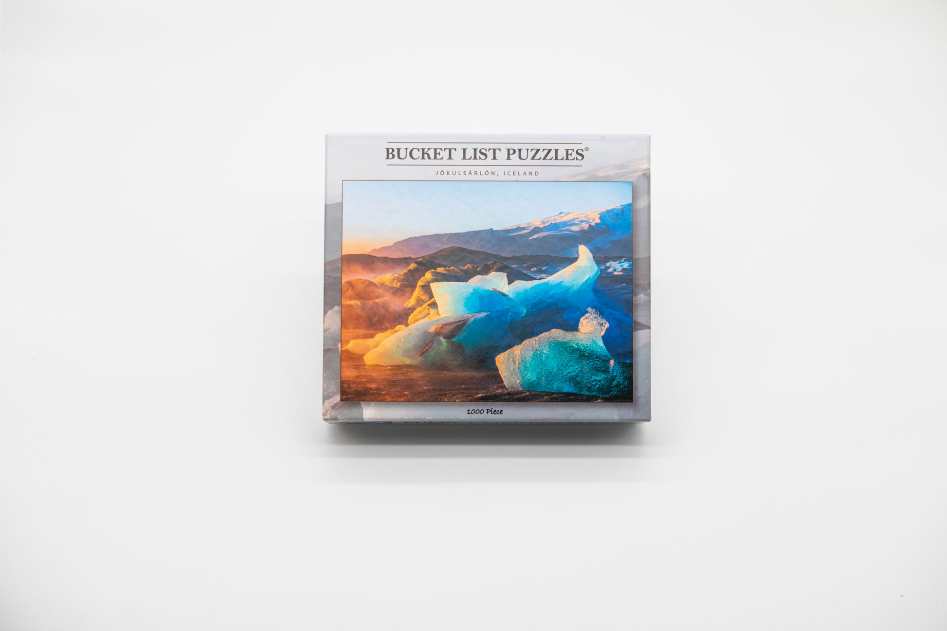 Bucket List Puzzles packaging with a scenic image on a white background