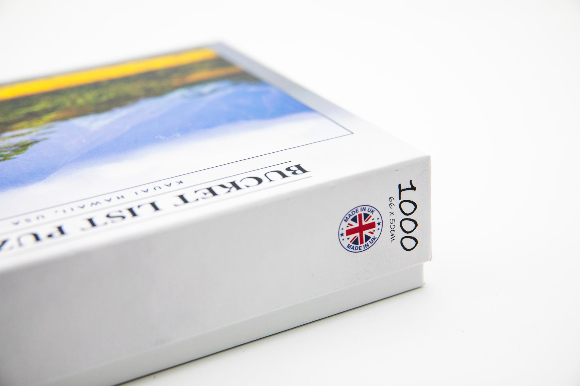 Close-up of a book or box with a British flag logo on a white background