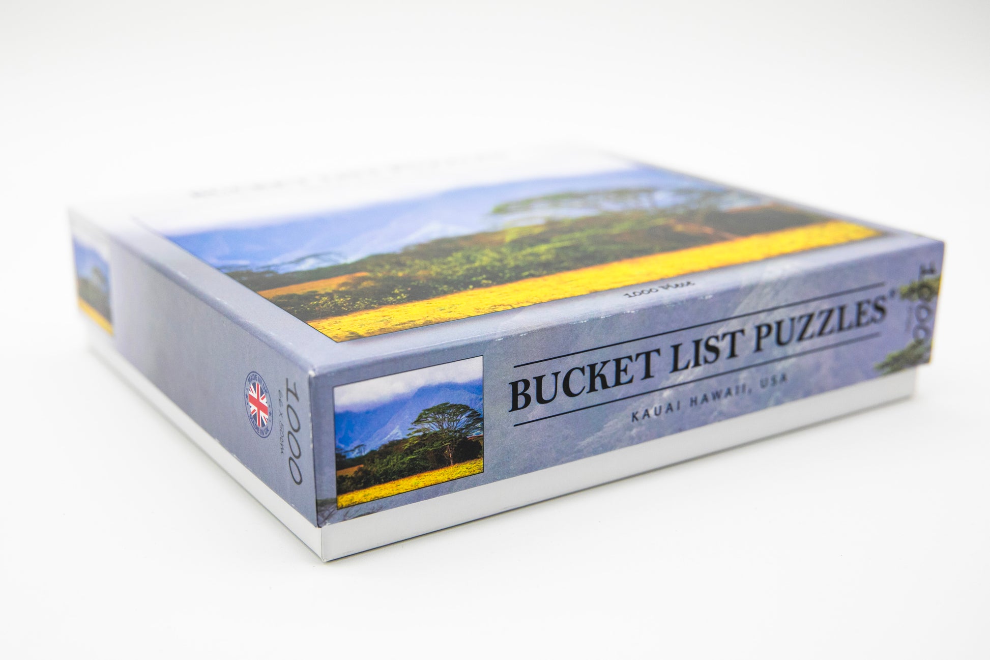 Box of Bucket List Puzzles with scenic images on a white background