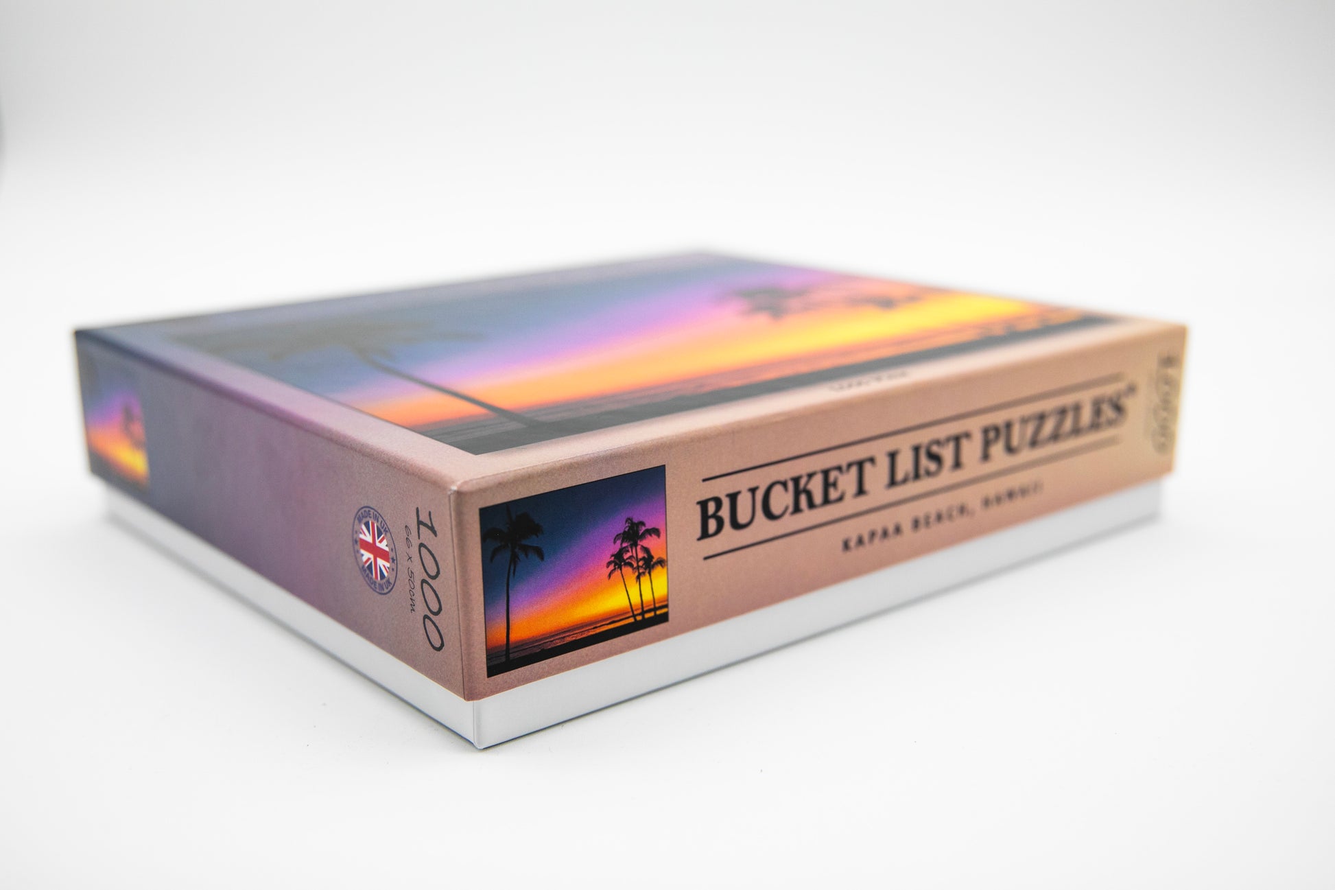Box of Bucket List Puzzles with sunset design on a white background