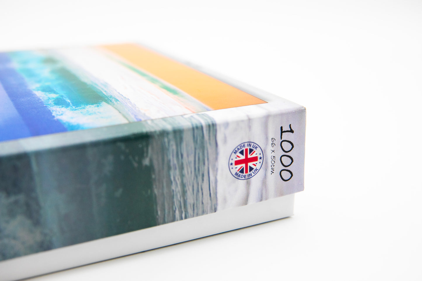 Close-up of a book with a British flag logo on a white background