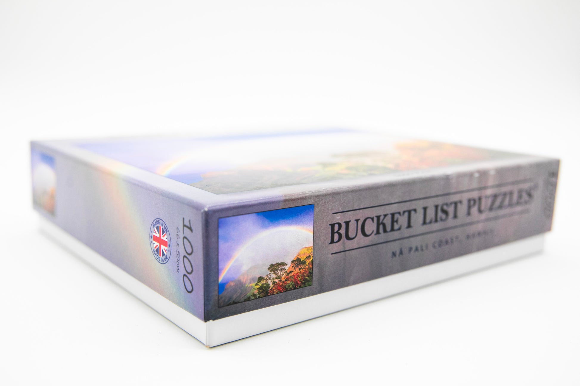 Box of 'Bucket List Puzzles' with scenic images on a white background