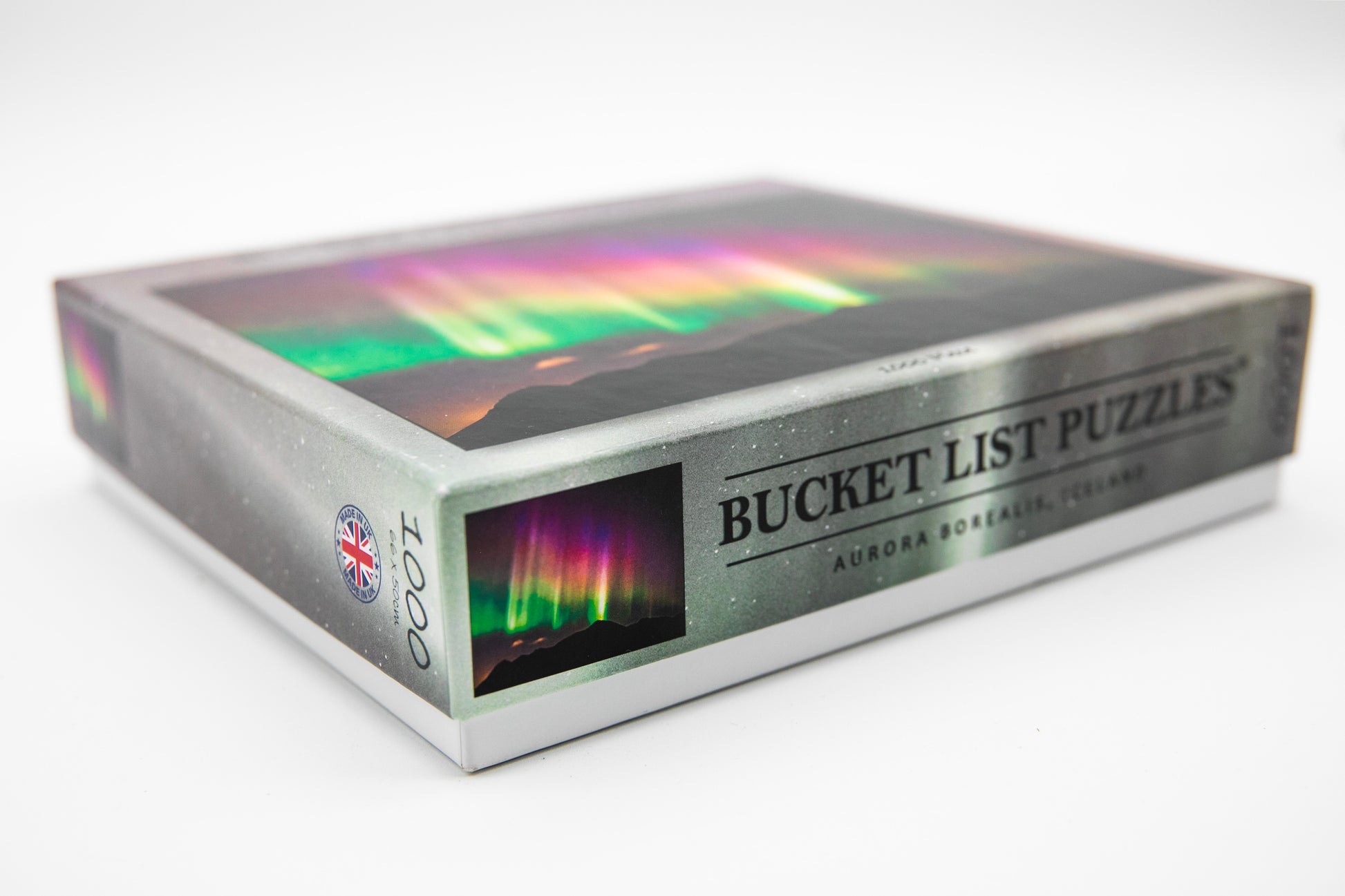 Box of Bucket List Puzzles with Northern Lights design on a white background