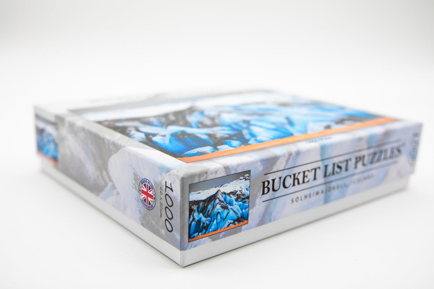Box of 'Bucket List Puzzles' on a white background